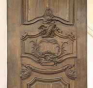 Détail du décor Rocaille d'un des vantaux de la porte cochère.