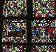 Scènes de la vie de sainte Geneviève : naissance de la sainte (à gauche) ; saint Germain d'Auxerre bénissant sainte Geneviève (à droite).